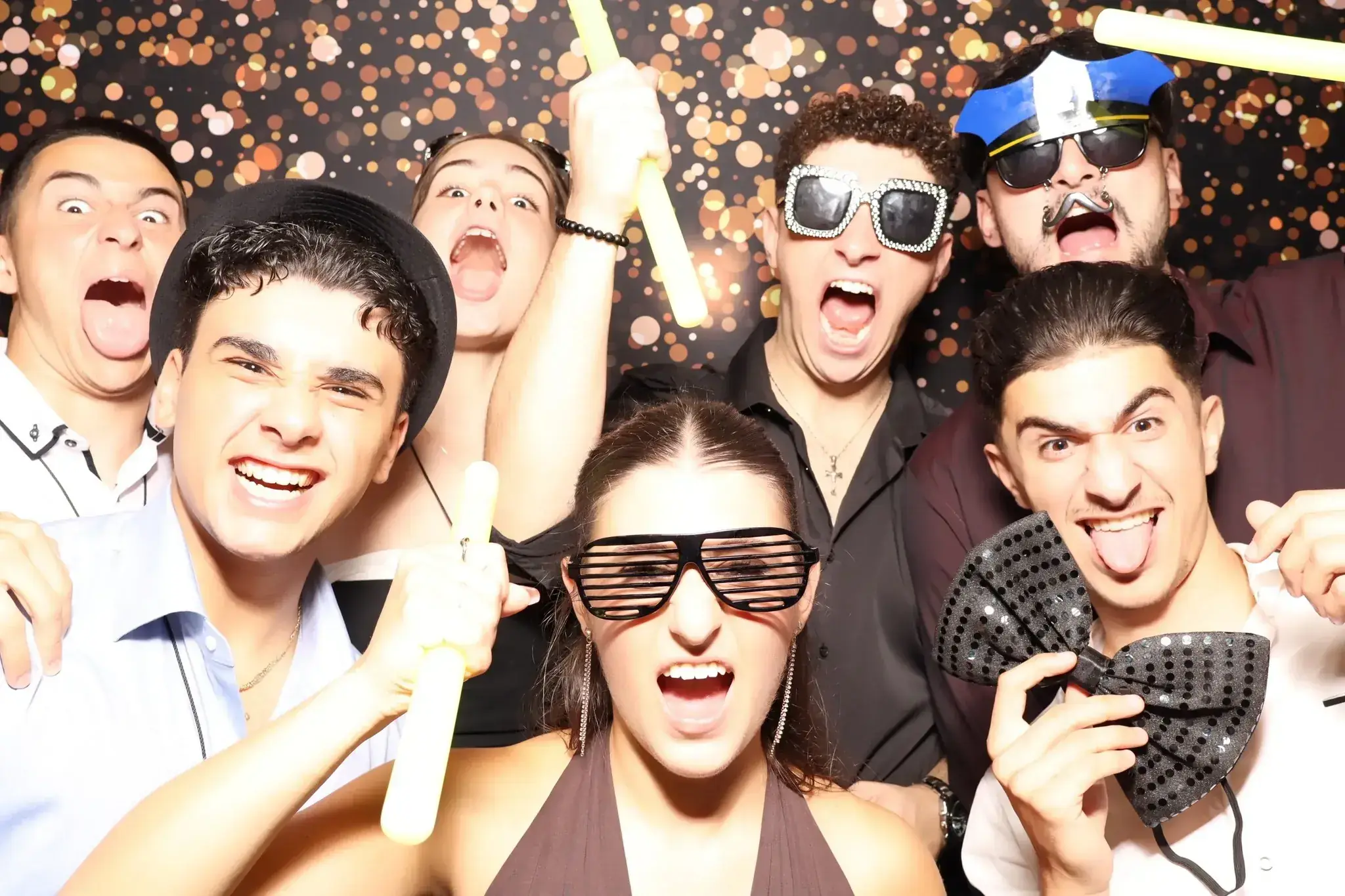 Guests at a fundraiser event using the Milas Events photo booth at The Lemnos by Clarence House