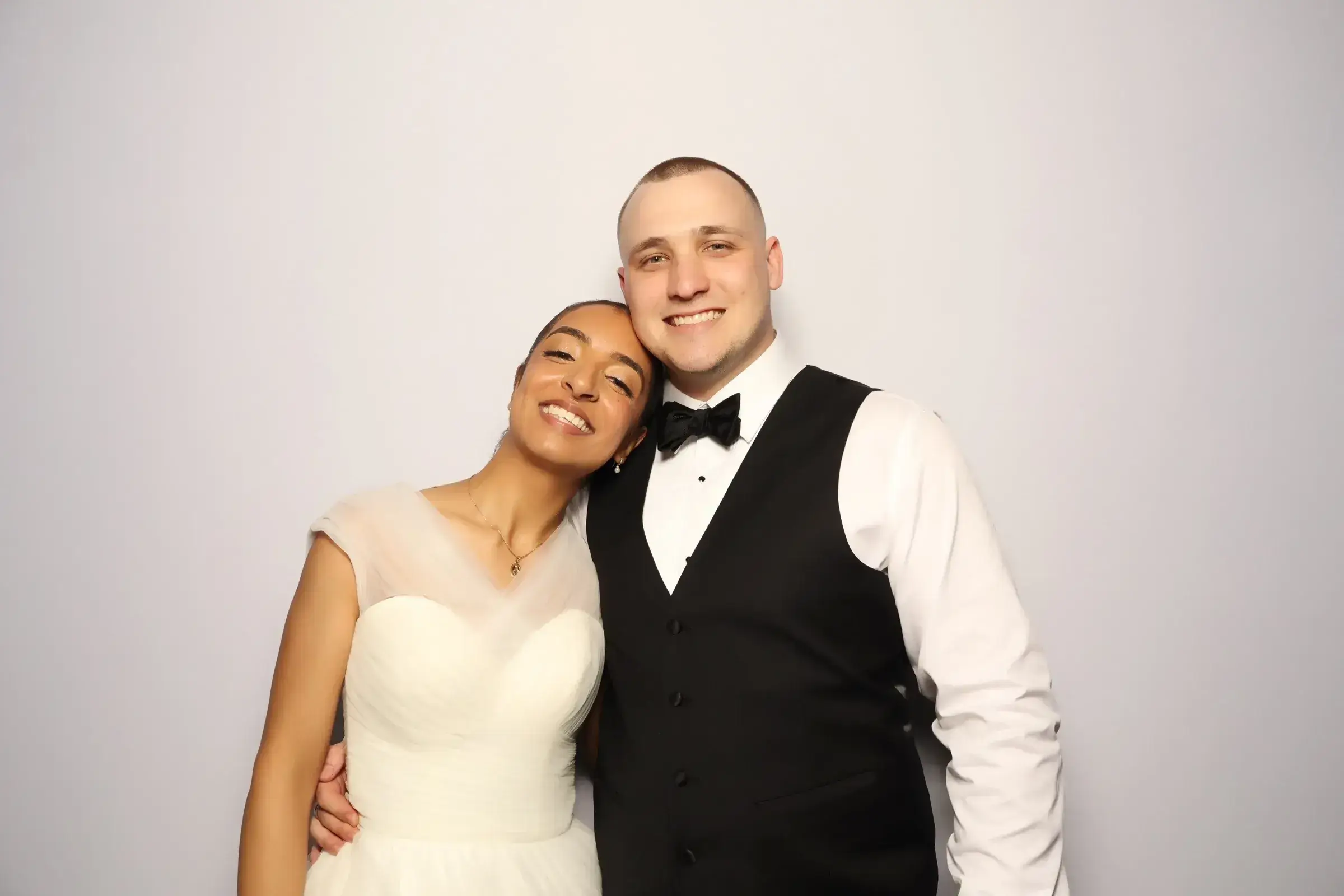 Wedding guests enjoying the Milas Events photo booth at Eden Venues